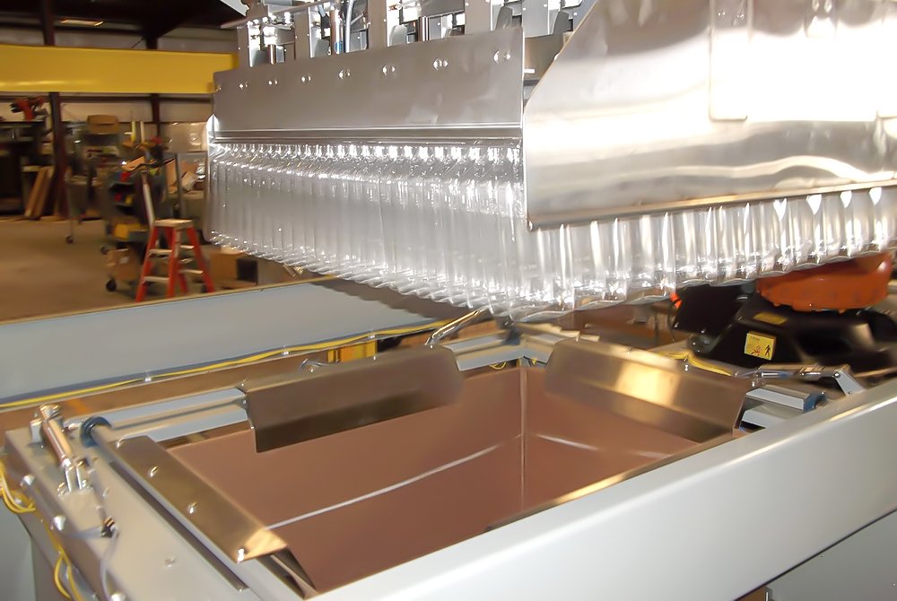 Automatic Gaylord and Tote Loading with Compressed Arrays